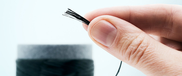 Bio-based carbon fibers can be less than four micrometers thin. Their mechanical, electrical and thermal performance matches that of conventional petroleum-based carbon fibers.